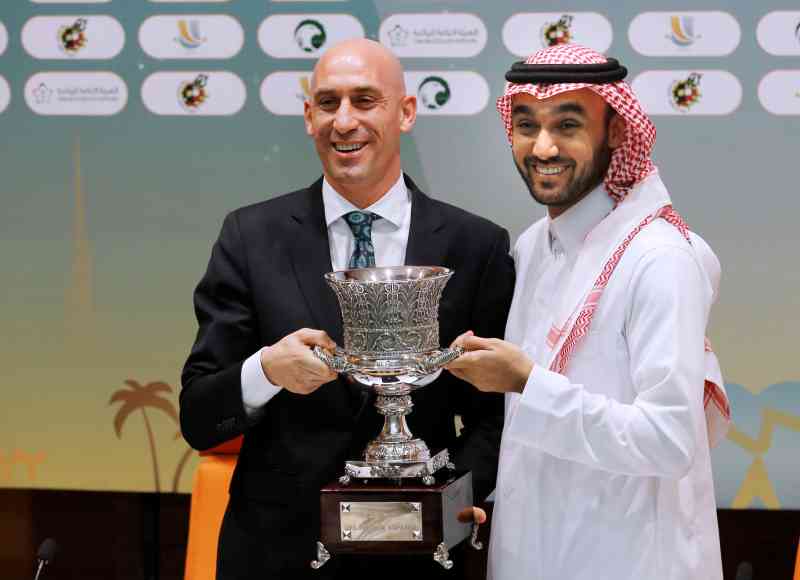 Rubiales, left, and Prince Abdulaziz bin Turki Al-Faisal with the Spanish Super Cup, now played in Saudi Arabia
